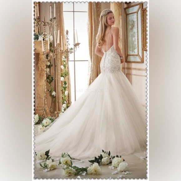 Crystallized Embroidery on Tulle Morilee Wedding Dress
STYLE #2874 - Picture 4 of 16